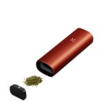 Portable Red Electric Spice Grinder Ground Herbs Spilling from Open End with Black Cap Nearby - Australia E-cigarette Store